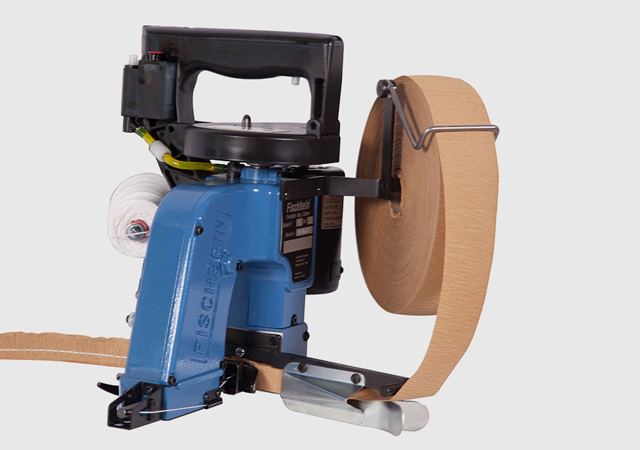 Fischbein Modelo F — Cosedora con papel crepé